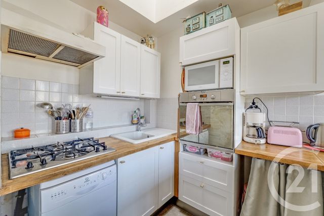 Appartement F4 à vendre - 4 pièces - 72.77 m2 - PARIS - 75018 - ILE-DE-FRANCE - Century 21 République